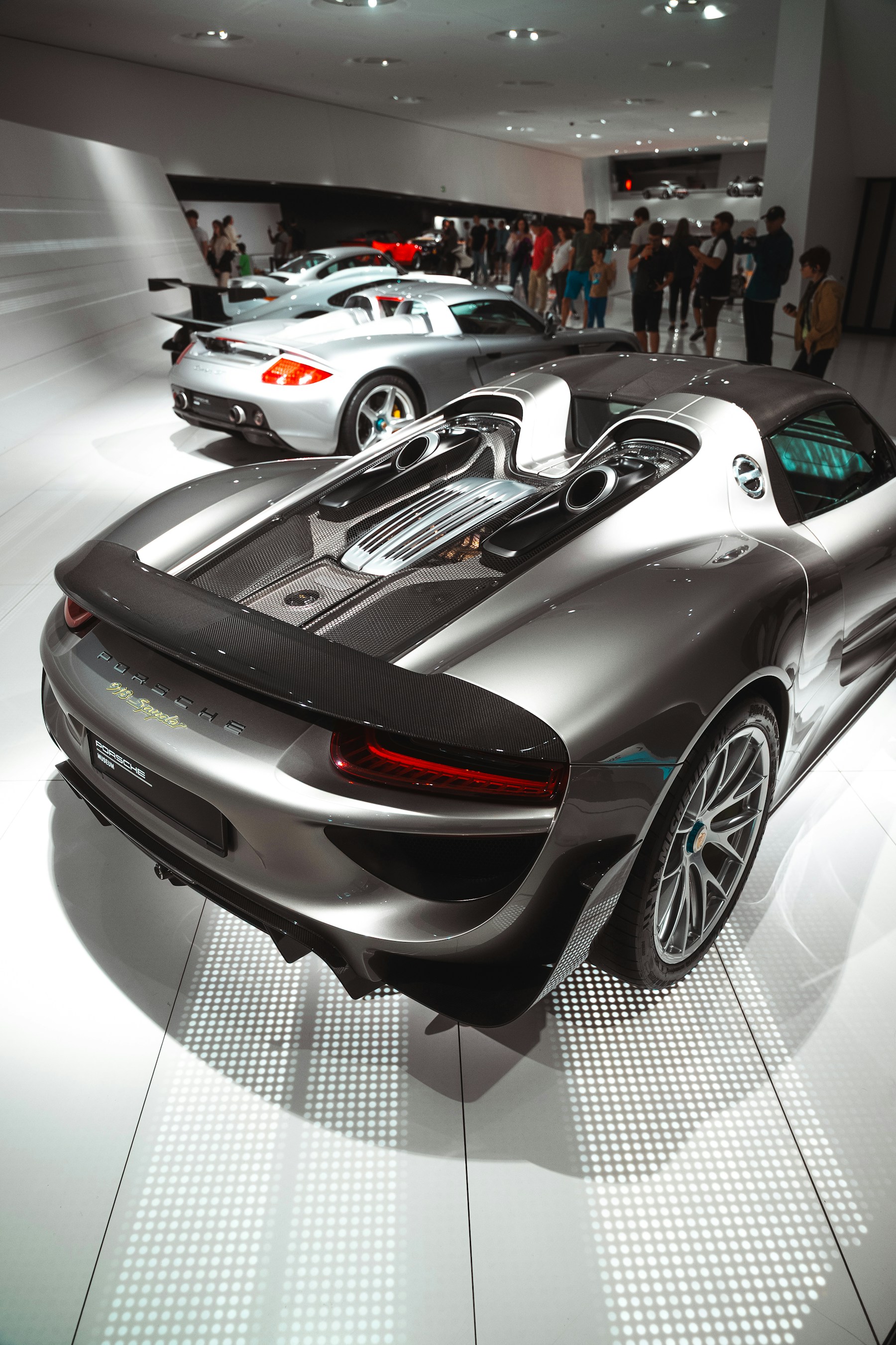 Porsche 918 Spyder displayed in a real showroom